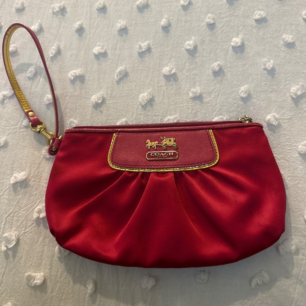 Pink coach wristlet